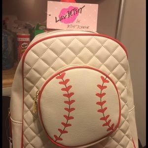 Betsey Johnson bookbag and wristlet