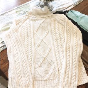 White name brand sweater.