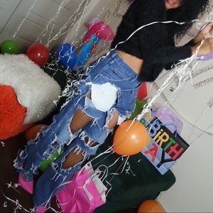 Shredding denim jeans.