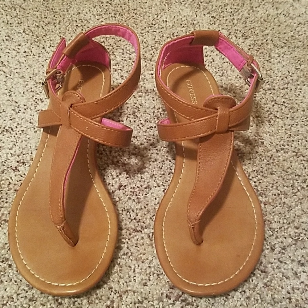 Brown express flip flops