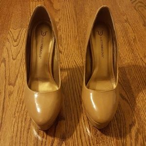 Stiletto tan pumps