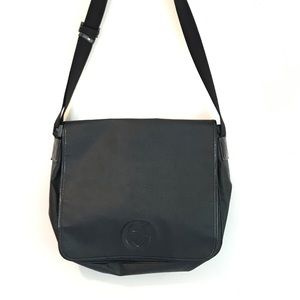 Authentic Gucci canvas messenger bag.