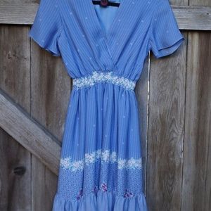 Blue Cocktail dress with flower detail