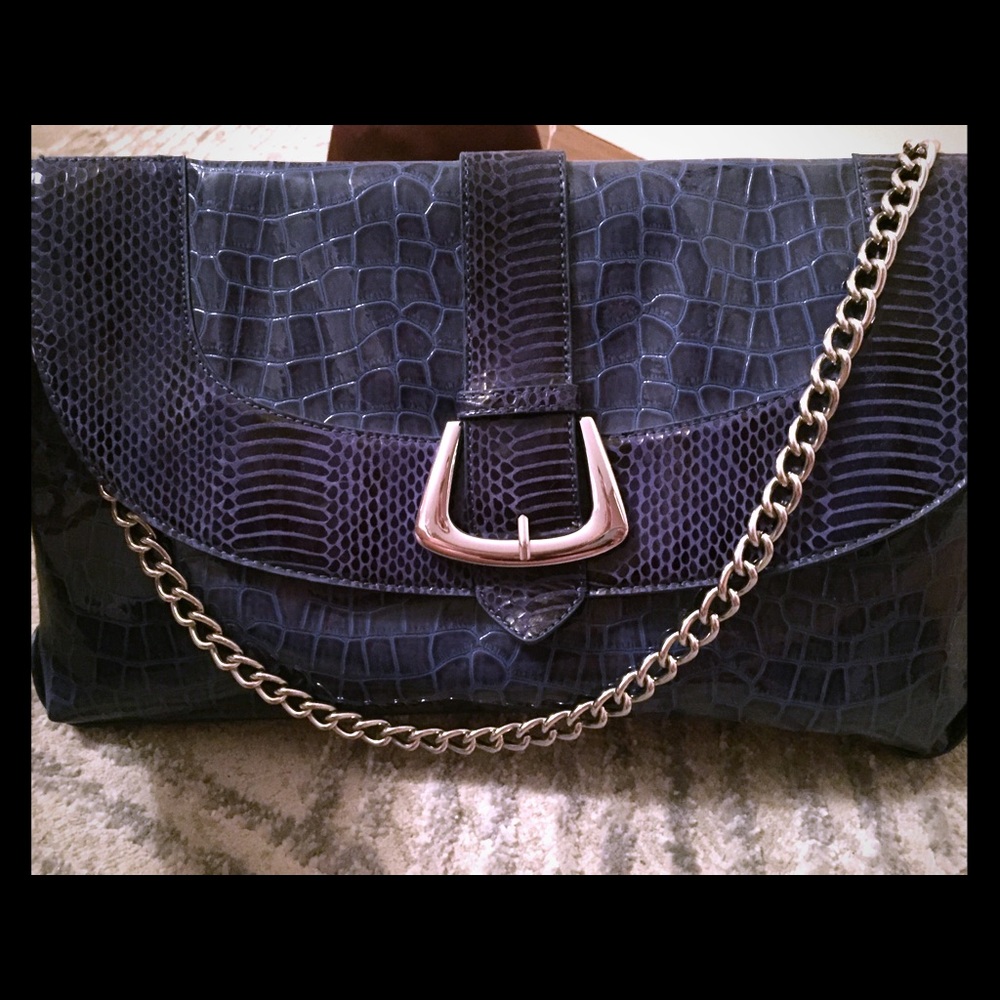 Cobalt blue envelope clutch with a chain