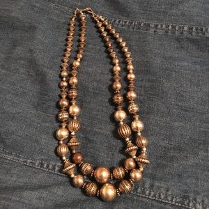 Double-strand silvery bead necklace
