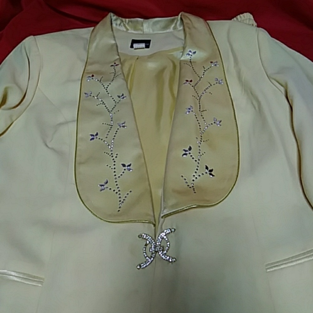 Two piece fully lined crepe suit.