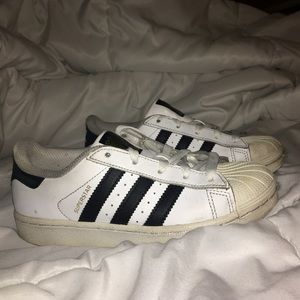 White-and-black superstar adidas