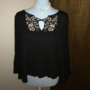 Bell sleeve criss cross blouse