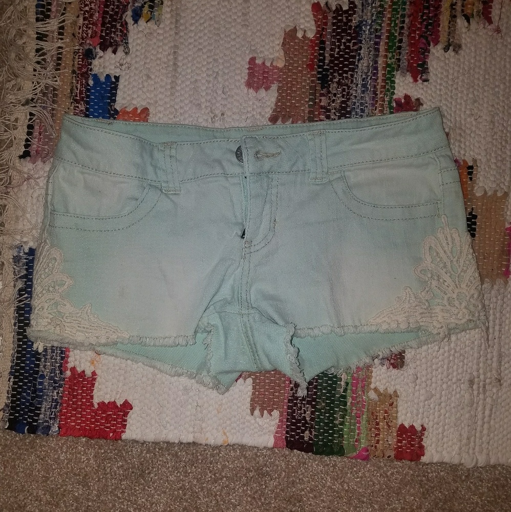 Light teal jean shorts