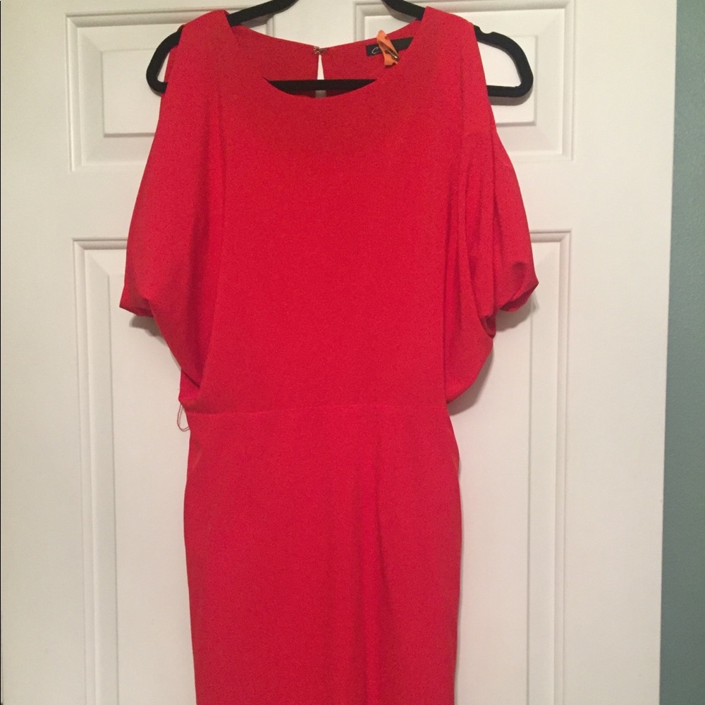 C. Luce open back red dress