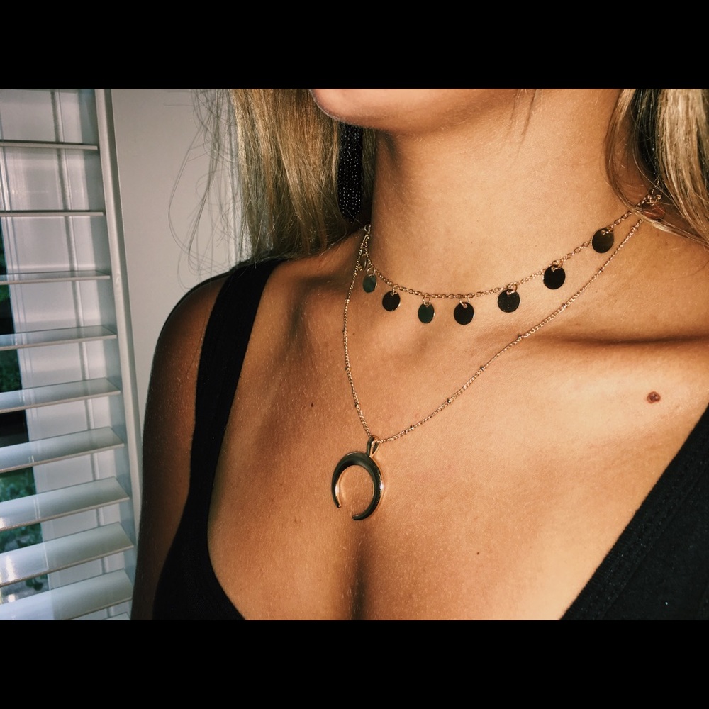 Crescent and coin necklaces
