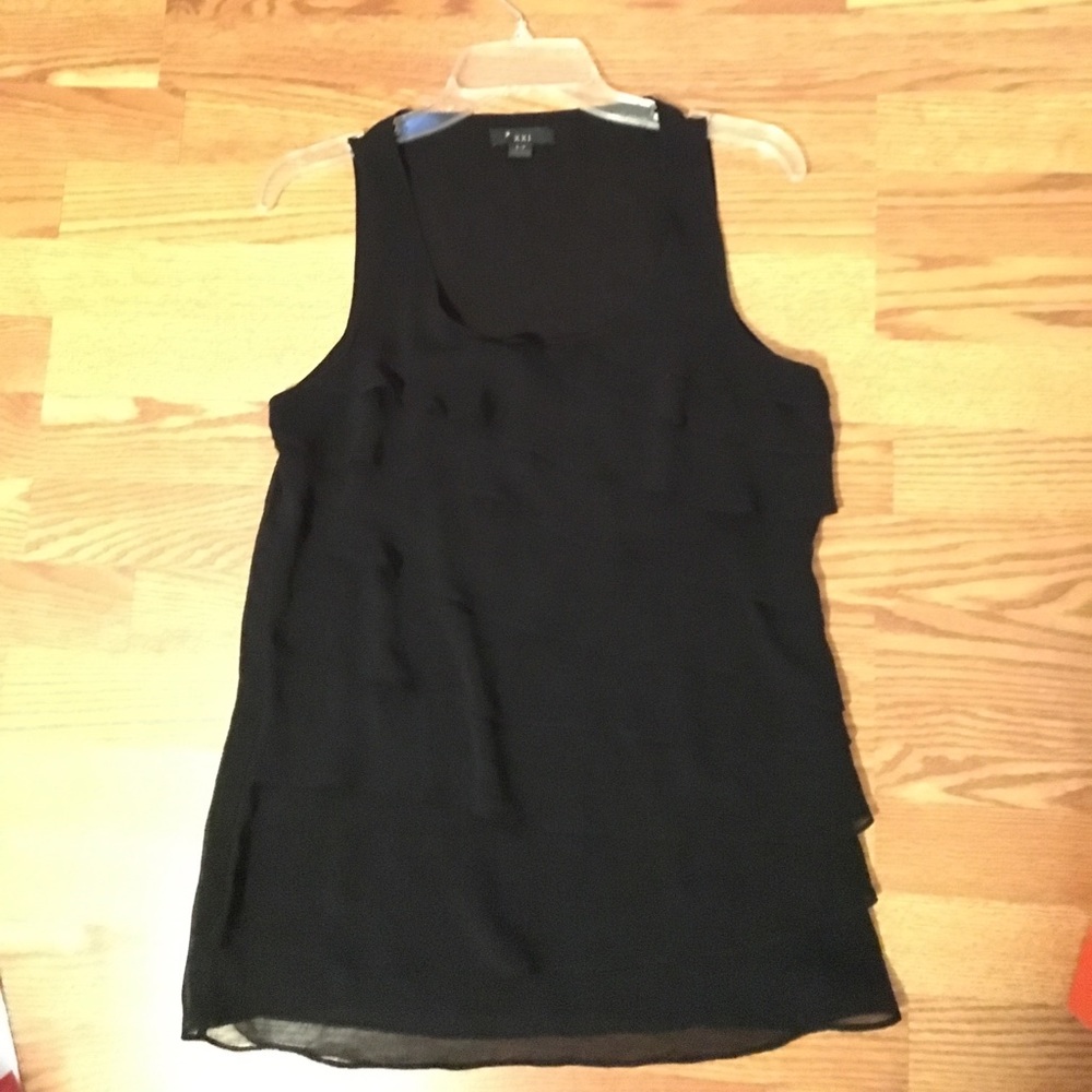 Black, sleeveless top with layered detail