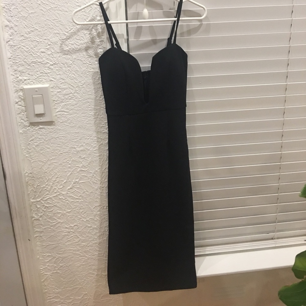 Black midi dress. Great for cocktail parties