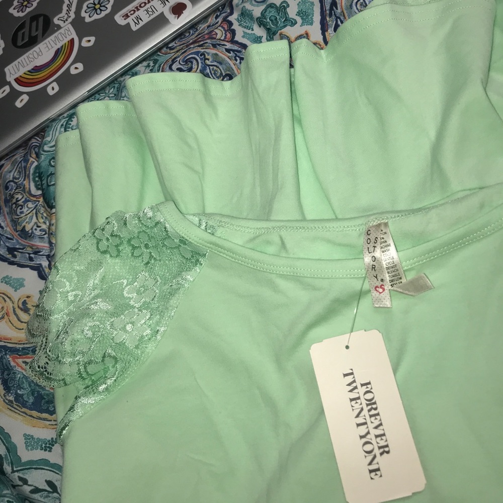 Mint peplum style shirt