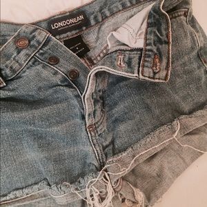 High-Waisted Cuffed Shorts with Fringe