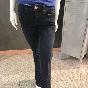 Dark wash bootcut jeans.