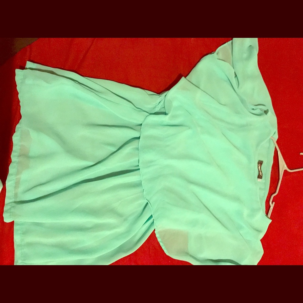 Layer bright green blouse.