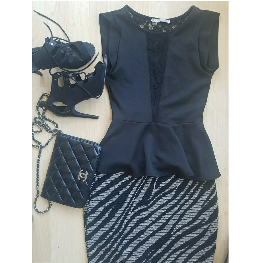 Black Peplum Top. - Picture 1 of 4