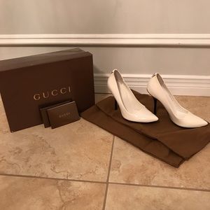 White Gucci high heels.