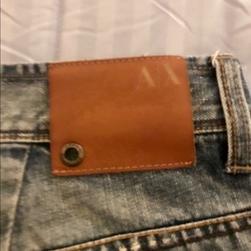 Armani Exchange Faded Jeans.
