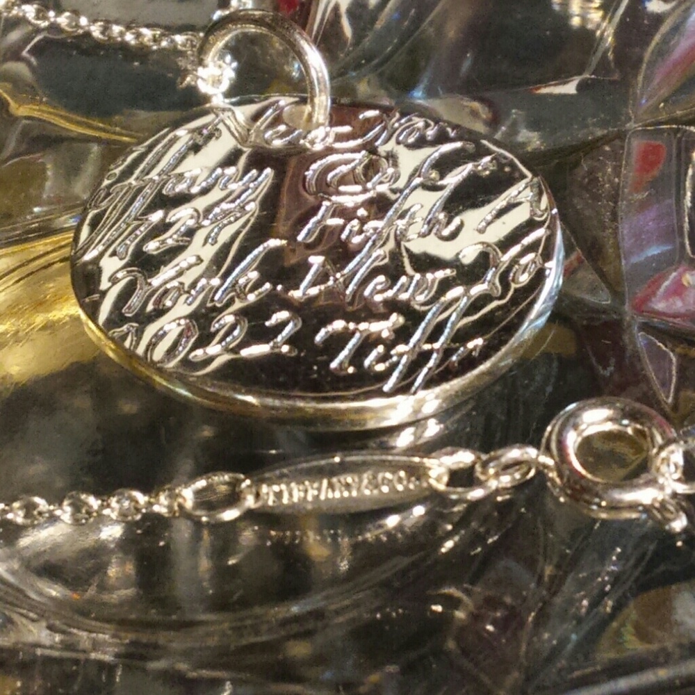 Gorgeous Tiffany & Co. Disc Note necklace