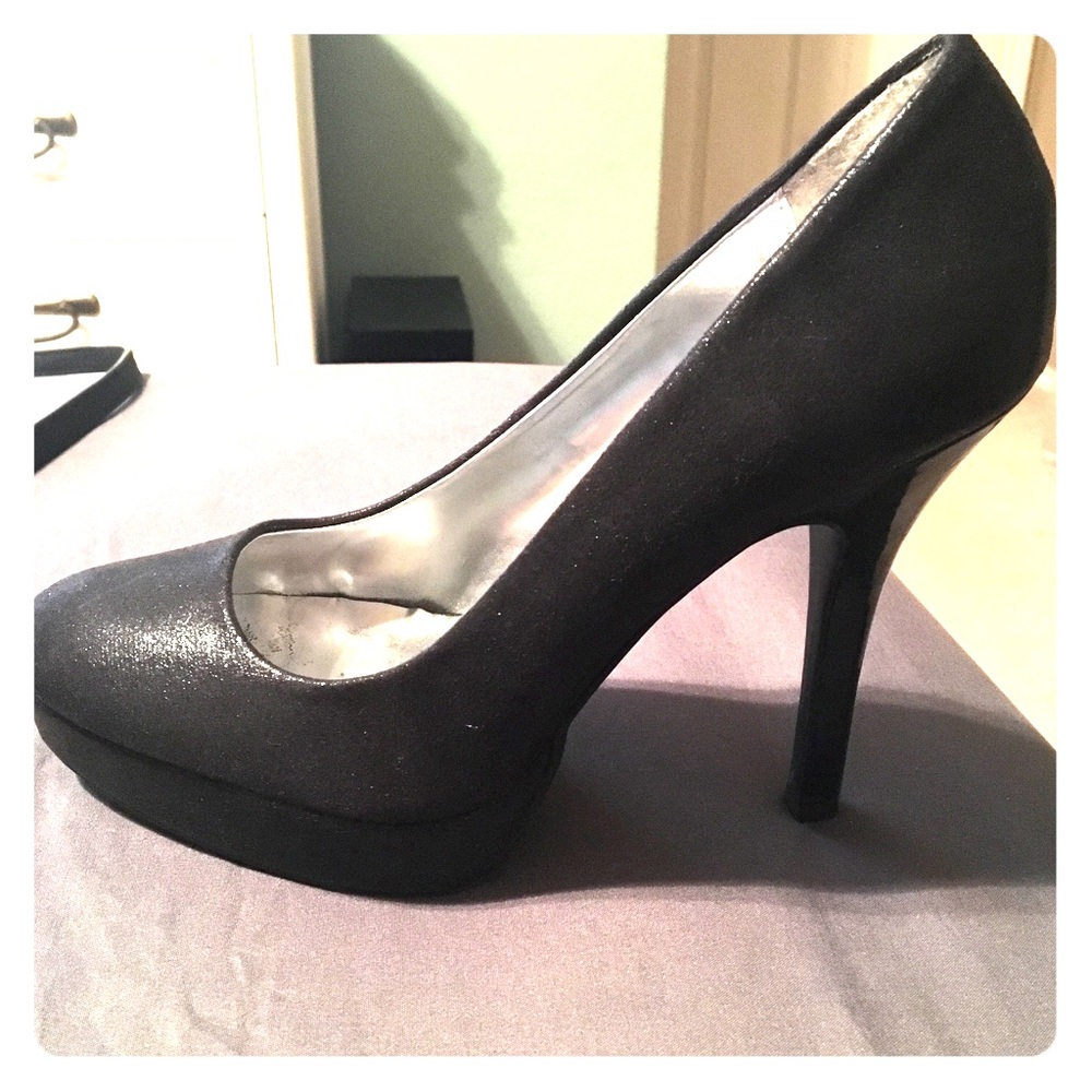Black platform pumps