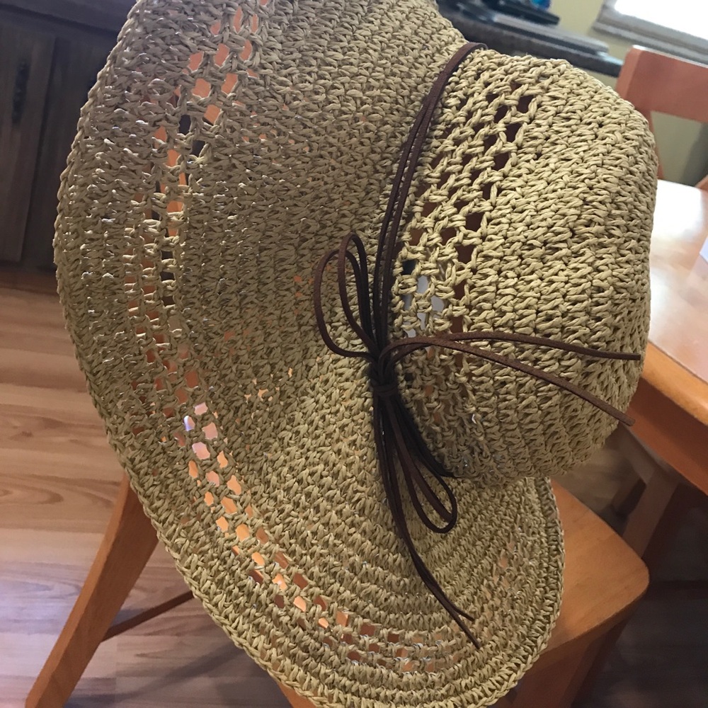 Floppy hat with brown leather tie