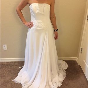 Maggie Sottero wedding dress tags attached