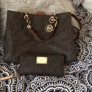 Brown Michael Kors purse and wallet
