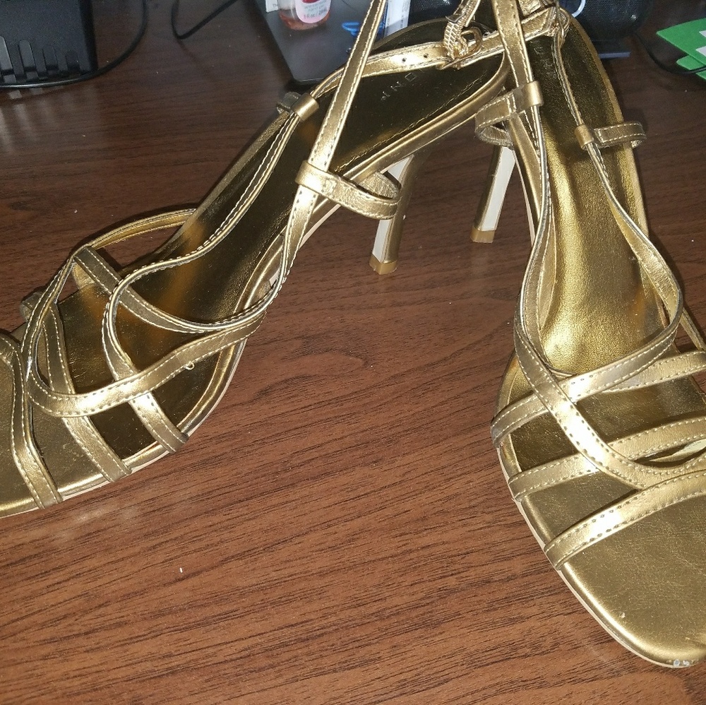 Gold strappy heels