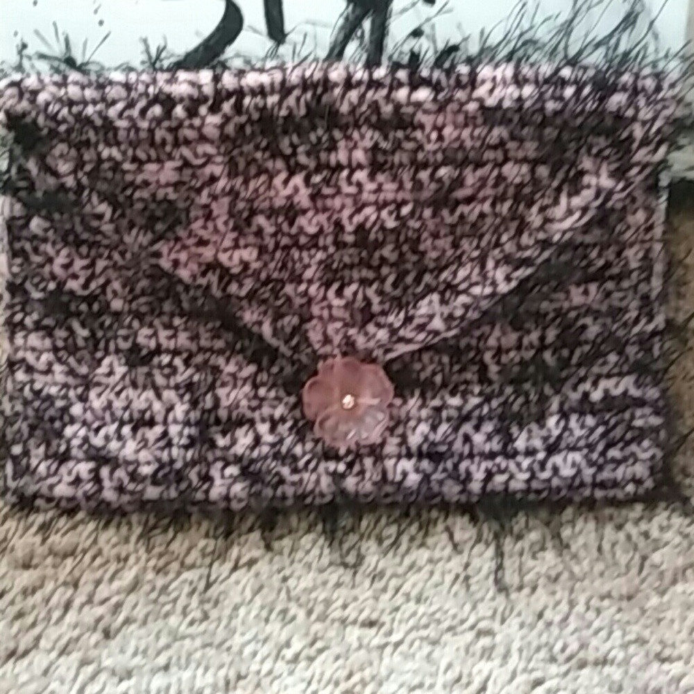 Pink feathery clutch