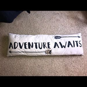 A "Adventure Awaits" Pillow