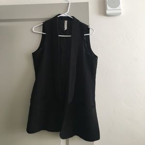Oversized sleeveless vest