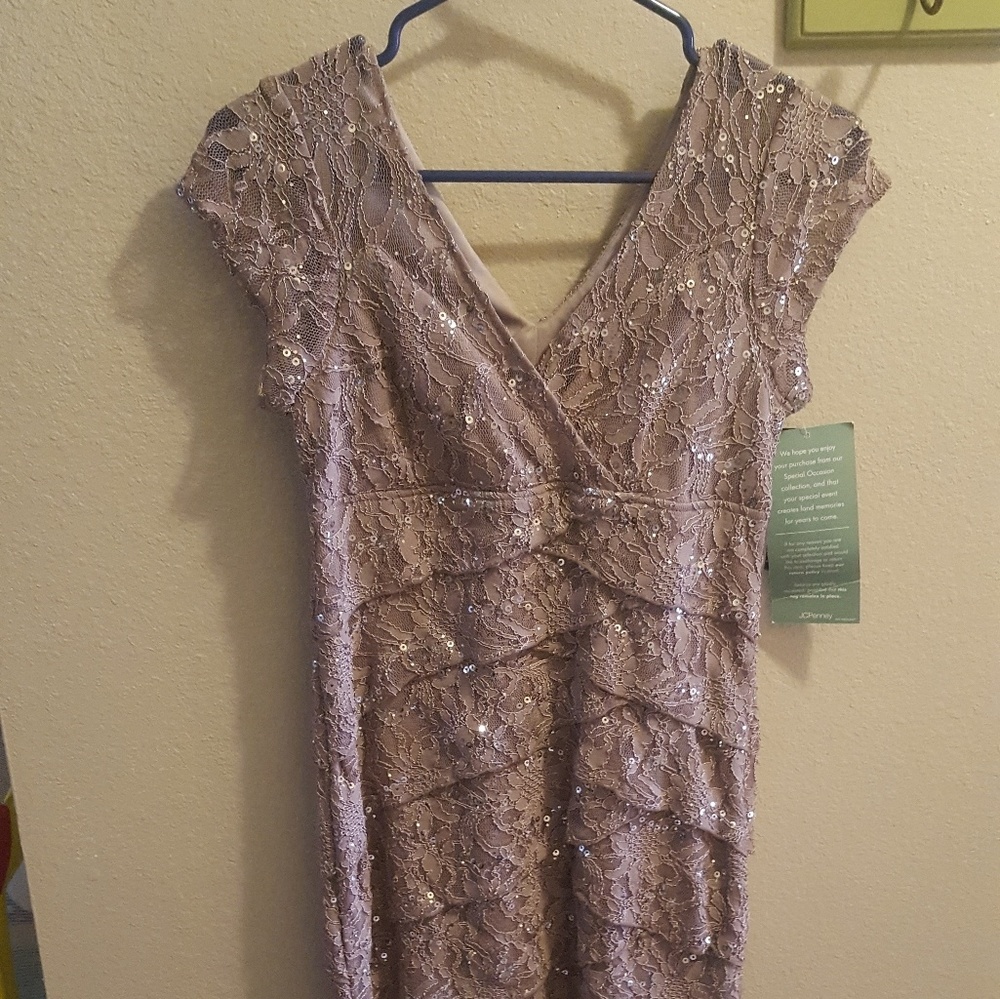 Brande new elegant knee length dress