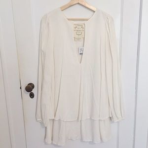 Free People off-white dress with deep-v. NWT