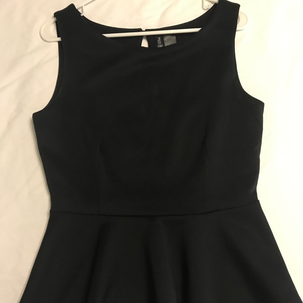 Bisou Bisou peplum top
