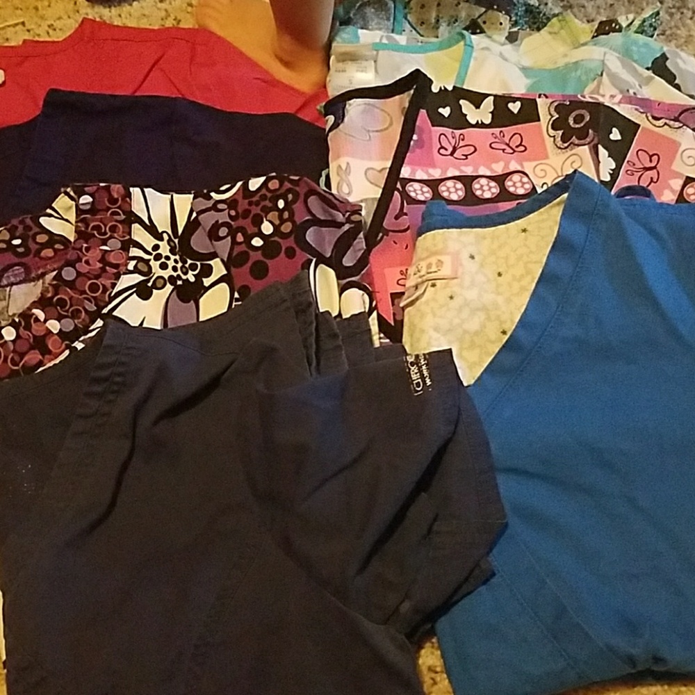 Multiple scrub tops, size Small and Medium.
