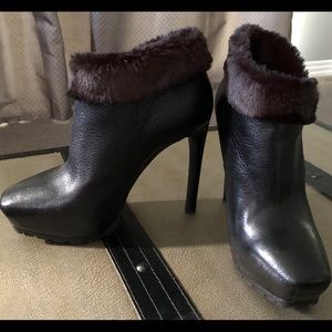 Women’s black Guess boots: size 7M