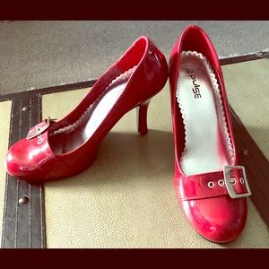 Women’s red heels: size 6.5