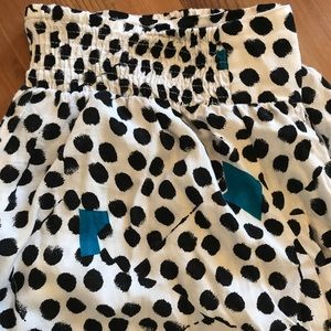 Pattern skirt. Hits just above knee. Black/white