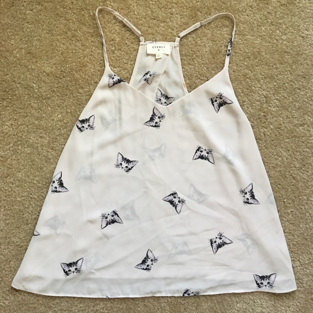 Beige polyester spilt back kitty top!