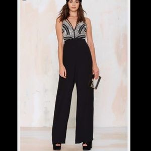 ❌ SOLD ❌ Silver sequin jumpsuit by Nasty Gal
