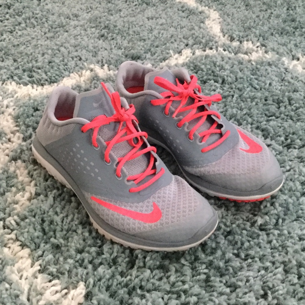 Women's size 8.5 Nike- Fit sole running shoes.