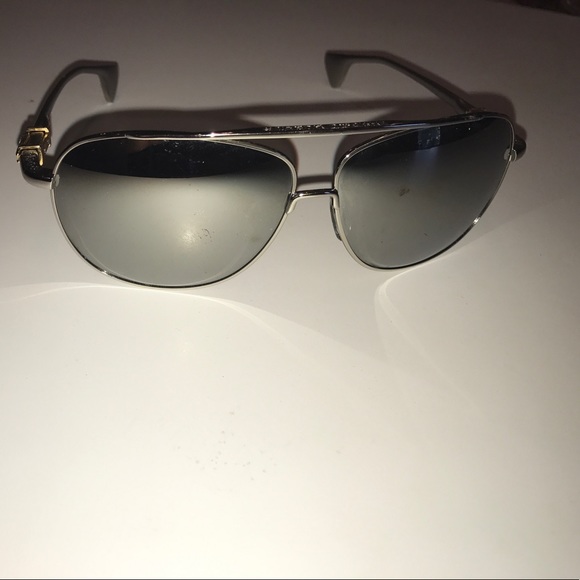 Chrome Hearts sunglasses with real gold accents.