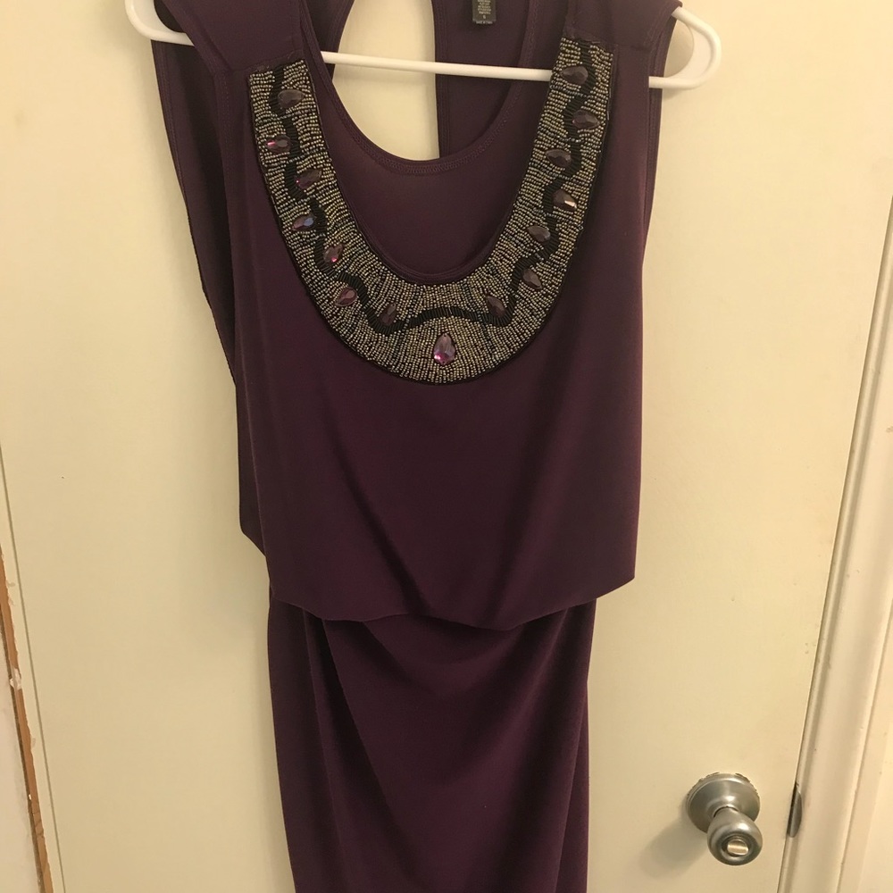 Purple cocktail dress with jewel detail