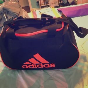 Black and orange adidas gym bag
