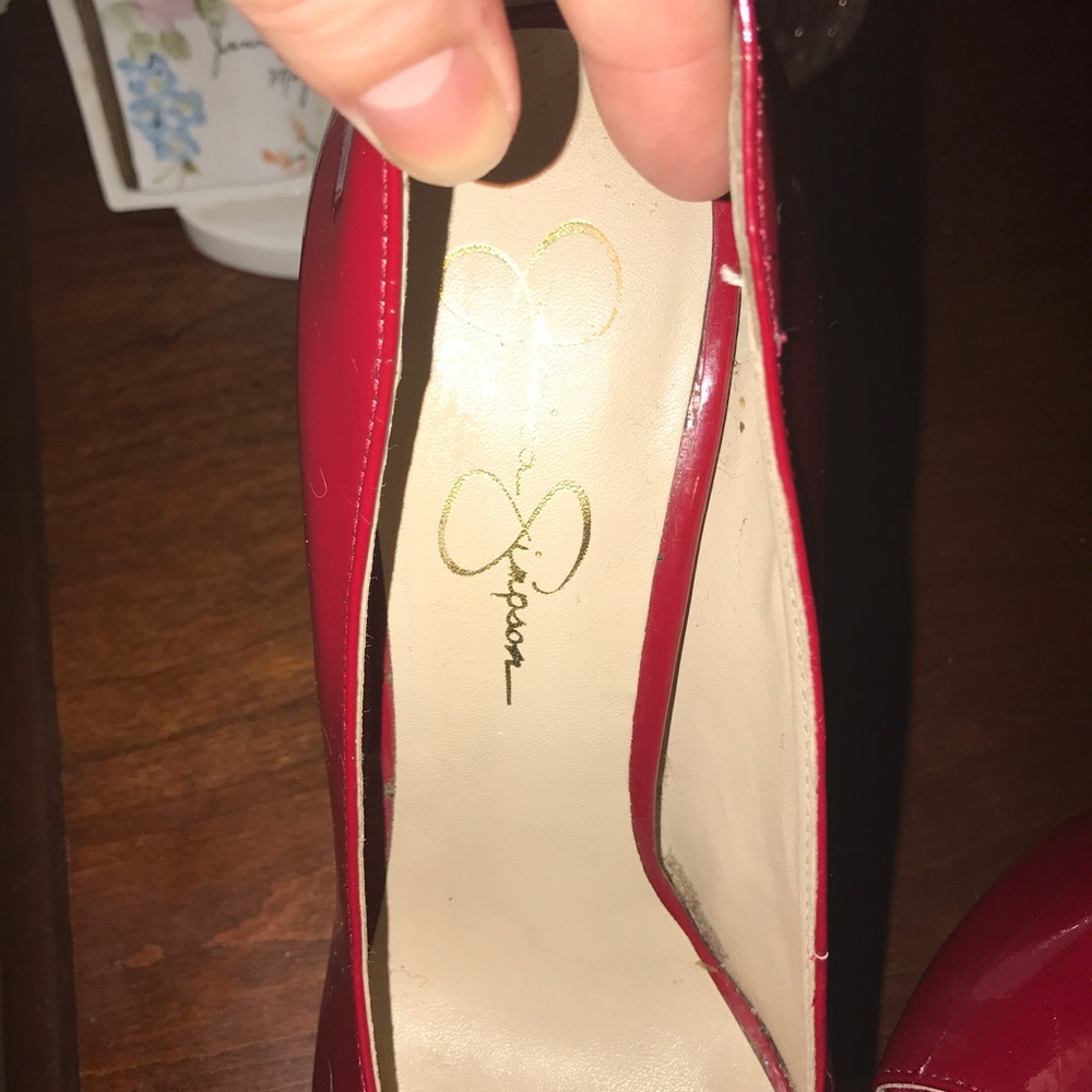 Red patent leather pumps