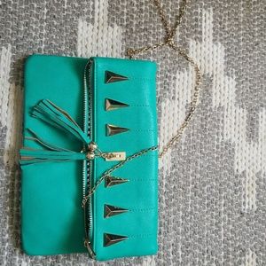 Gorgeous green satchel with chain and tassels