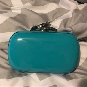 DvF turquoise patent leather clutch purse