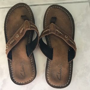 Brown suede leather slipper sandals.